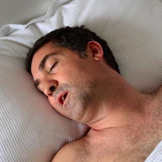 De nombreuses personnes souffrent d'apnées du sommeil sans le savoir.
Rafael Ben-Ari
Fotolia [Rafael Ben-Ari]