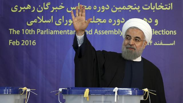 Hassan Rohani, le président iranien, s'est réjoui de la défaite des conservateurs. [Iranian Presidency Office via AP]