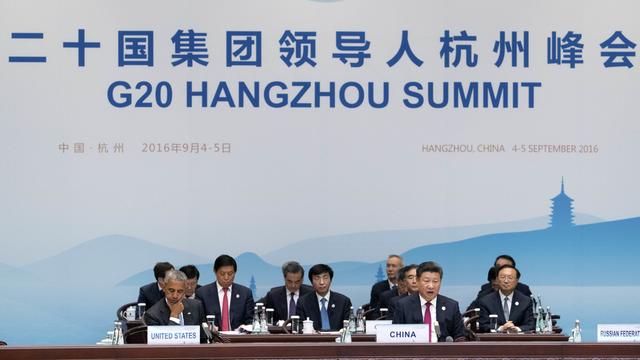 Xi Jinping a appelé à plus de coordination entre les Etats membres du G20. [key - P Photo/Mark Schiefelbein, Pool]