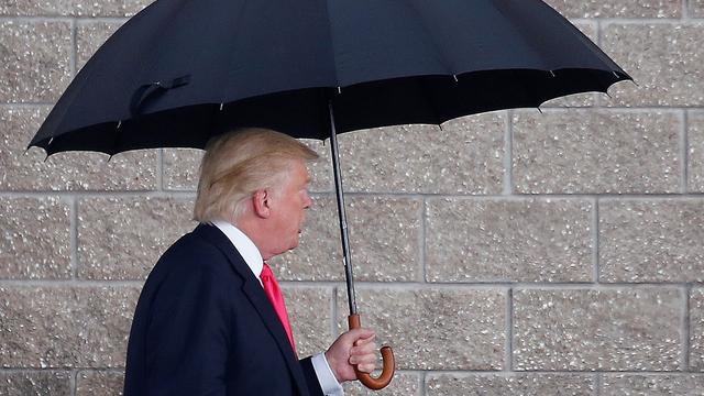 Donald Trump arrive à un meeting de campagne à Tampa, en Floride, le 24 août 2016. [Reuters - Carlo Allegri]