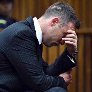 Oscar Pistorius durant son procès lundi à Pretoria. [AP/Keystone - Phill Magakoe]