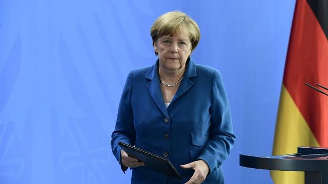 La chancelière allemande Angela Merkel a livré samedi sa première réaction au lendemain de la fusillade dans un centre commercial de Munich. [AFP - Tobias Schwarz]