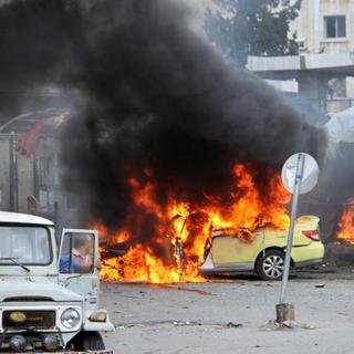 Une photo de l'attentat qui a frappé la ville de Tartous, diffusée par le régime syrien. [AP/Keystone - SANA]