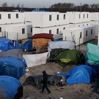 Le camp de Calais. [AP Photo/Keystone - Michel Spingler]