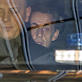 Nicolas Sarkozy à son arrivée mardi matin au pôle financier du Parquet de Paris. [AFP - Thomas Samson]