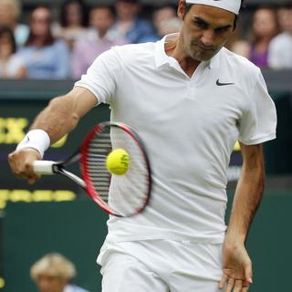 Roger Federer n'a pas rassuré au début du tournoi. [AP/Keystone - Alastair Grant]