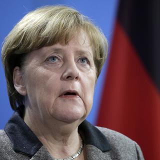Angela Merkel durant la conférence de presse. [AP Photo/Keystone - Michael Sohn]