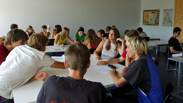 Cours de français dans une classe de Wil, en Thurgovie. [Keystone - Regina Kühne]