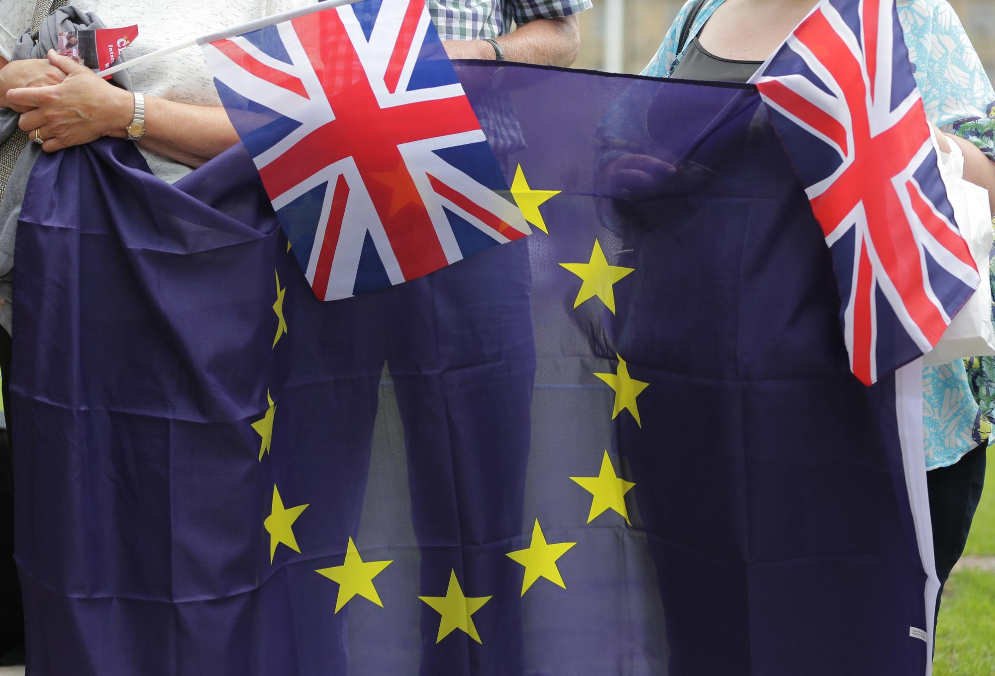 De nombreux commentateurs estiment que les Britanniques vont faire jouer la montre avant de sortie de l'UE. [AFP - Daniel Leal-Olivas]