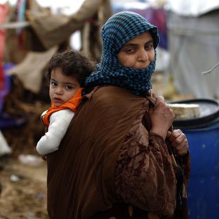 Une femme syrienne dans un camp de réfugiés au Liban. [Keystone - Hassan Ammar]