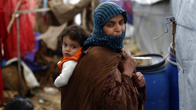 Une femme syrienne dans un camp de réfugiés au Liban. [Keystone - Hassan Ammar]