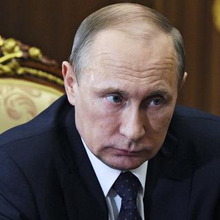 La Russie de Vladimir Poutine est confrontée à un isolement diplomatique. [AP/Keystone - Mikhail Klimentyev]