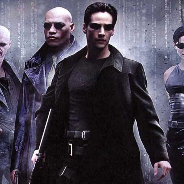 Joe Pantoliano, Laurence Fishburne, Keanu Reeves, Carrie-Anne Moss dans "Matrix" (1999). [AFP]