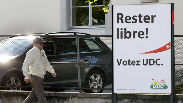 Une affiche électorale de l'UDC à Genève. [Keystone - Salvatore Di Nolfi]
