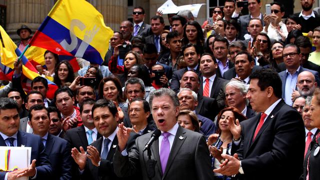 Le président colombien Juan Manuel Santos annonce la signature de l'accord de paix le 25 août à Bogota le 25 août 2016. [Keystone - AP Photo/Felipe Caicedo]