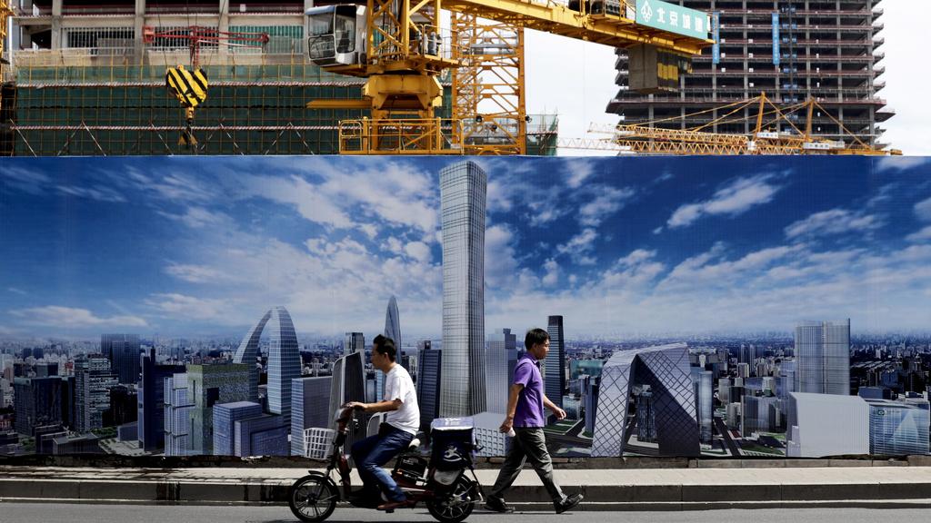 Les prix de l'immobilier ont encore pris l’ascenseur ces derniers mois en Chine. [Keystone - Andy Wong - AP Photo]