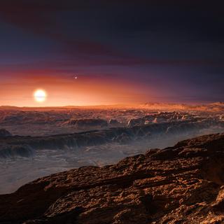 Vue d'artiste de la surface de Proxima b, tournant autour de la naine rouge Proxima Centauri, l'étoile la plus proche du système solaire. [keystone - European Southern Observatory]