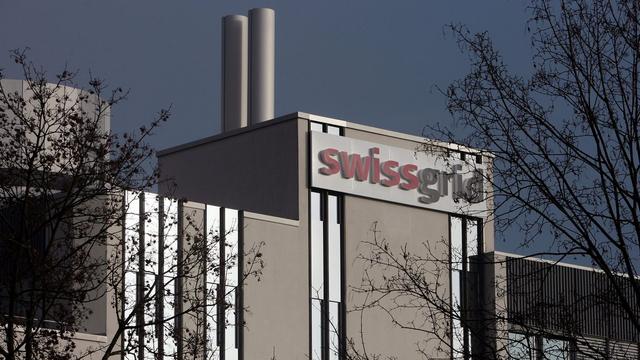 Le logo de Swissgrid sur le bâtiment du siège de l'entreprise. [Keystone - Eddy Risch]