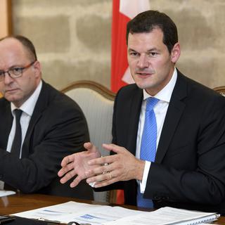 Le procureur général Olivier Jornot (à gauche) et le conseiller d'Etat Pierre Maudet, en 2018. [Martial Trezzini]