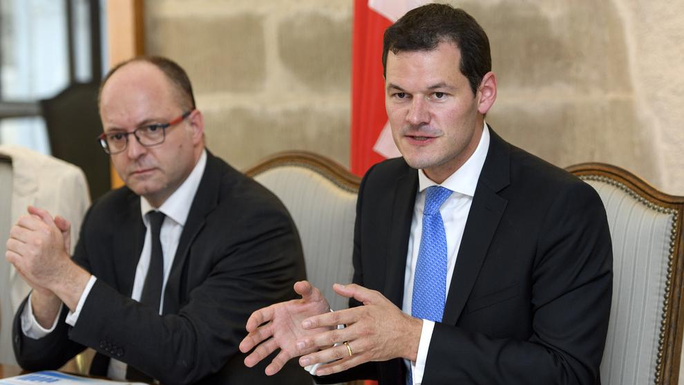 Le procureur général Olivier Jornot (à gauche) et le conseiller d'Etat Pierre Maudet, en 2018. [Martial Trezzini]
