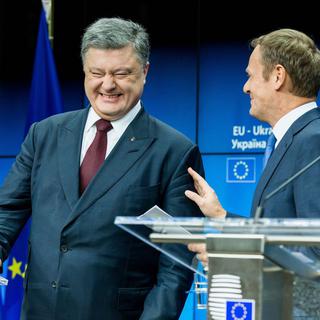 Le président ukrainien Petro Porochenko et le président du Conseil européen Donald Tusk. [Keystone - Stéphanie Lecocq]