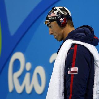 Les JO voient se cotoyer des stars comme le nageur Michael Phelps et des sportifs amateurs inconnus du grand public. [EPA/Keystone - Patrick B. Kraemer]
