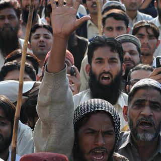 Des milliers de personnes descendues dans la rue ont réclamé la mort d’Asia Bibi, une chrétienne emprisonnée depuis 2009 pour avoir violé la loi anti-blasphème du Pakistan. [AFP - Arif Ali]