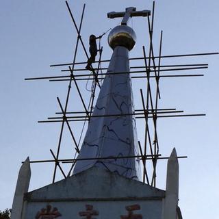 Le pouvoir communiste de la province chinoise du Zehjiang a déjà démoli plus de 1700 croix en deux ans. [AP/Keystone - Didi Tang]
