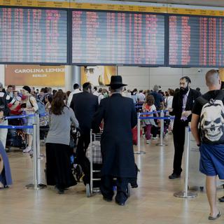 Des membres du "Conseil œcuménique des Eglises" ont été arrêtés à l'aéroport de Tel Aviv. [Keystone - Jim Hollander]