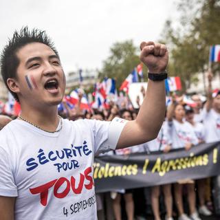 La communauté asiatique française a manifesté dans les rues de Paris. [Keystone - Christophe Petit Tesson]
