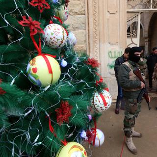 Des chrétiens du Nord de l’Irak ont pu à nouveau fêter Noël à l’église. [AFP - Safin Hamed]