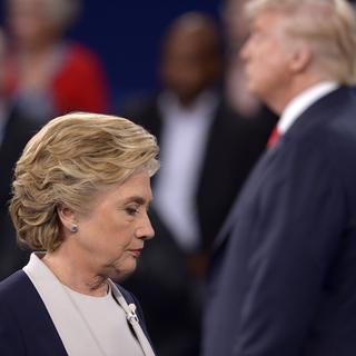 Hillary Clinton et Donald Trump s'affronteront lors d'un troisième et dernier débat avant l'élection présidentielle. [Saul Loeb]