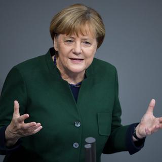 La chancelière allemande Angela Merkel devant le Bundestag mercredi 23 novembre. [KEYSTONE - BERND VON JUTRCZENKA]