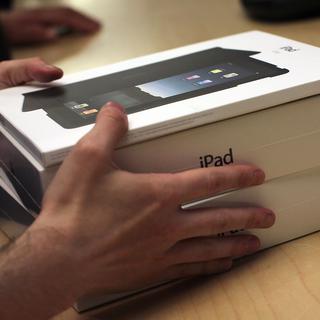 Achat d'un iPad. [Getty Images/AFP - Spencer Platt]