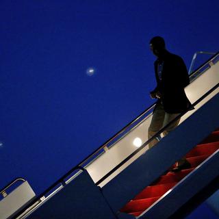 Barack Onama à son arrivée dans la nuit à Dallas. [Reuters - Jonathan Ernst]