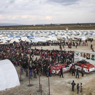 Le bilan s'alourdit en Syrie, alors que les réfugiés affluent à la frontière turque. [AFP/Anadolu Agency - Fatih Aktas]
