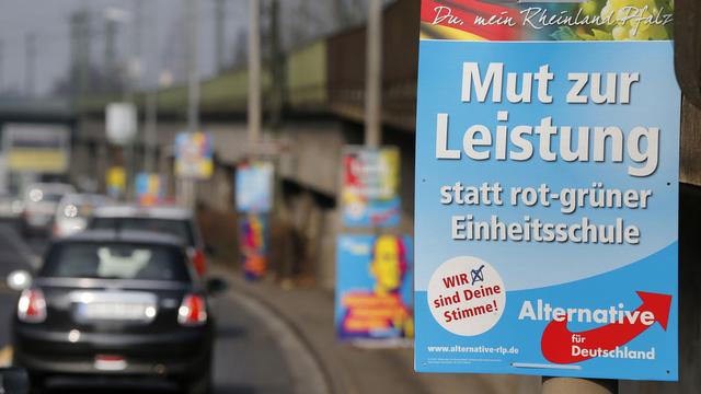 Affiche électorale de l'AfD avant les élections régionales de dimanche. [AP/Keystone - Michael Probst]