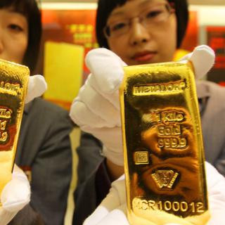 Des lingots d'or produits par la société neuchâteloise Metalor. [EPA/Keystone - Lao Cai]