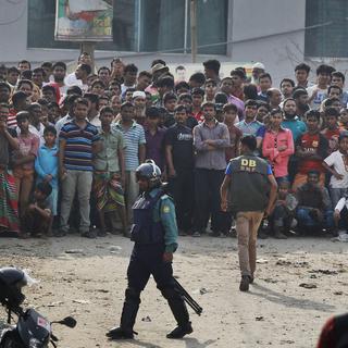 Au Bangladesh, le coup de filet sans précédent de la police a permis l'arrestation d'une trentaine d'islamistes présumés et de centaines de suspects de droit commun. [Keystone - AP Photo]