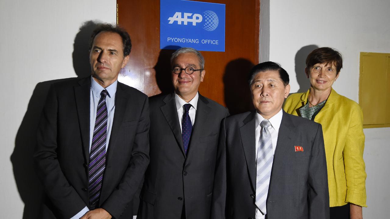 Philippe Massonnet à l'inauguration du bureau AFP de Pyongyang. [AFP - Kim Won-Jin]