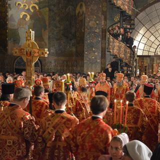Cérémonie orthodoxe pour la fête de Pâques dans une église de Kiev. [AFP - Hakan Caliskan]