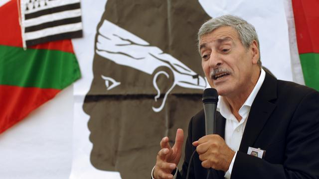 Ferhat Mehenni, president of the Kabylia Autonomy Movement (MAK), presenting his movement, in Corte, Corsica, on August 8, 2009. [AFP - STEPHAN AGOSTINI]