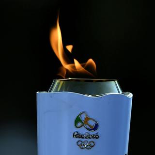 La flamme est à Rio, à quelques heures d'allumer la vasque olympique. [AFP - Johannes Eisele]
