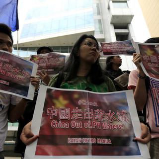 Des Philippins protestent contre les prétentions territoriales chinoises en Mer de Chine. [EPA/Keystone - STR]