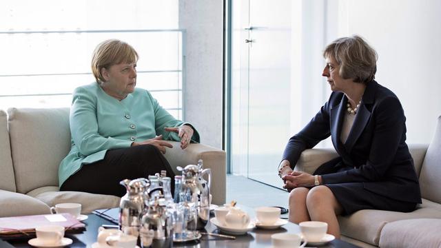 Angela Merkel et Theresa May se sont rencontrées à Berlin le 20 juillet. [Keystone - Guido Bergmann]