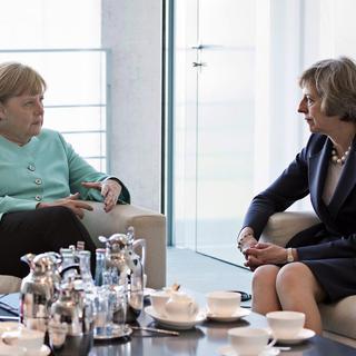 Angela Merkel et Theresa May se sont rencontrées à Berlin le 20 juillet. [Keystone - Guido Bergmann]