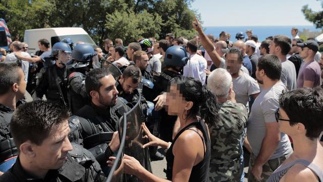 Quelque 500 personnes ont participé à un rassemblement à Bastia. [AFP - PASCAL POCHARD-CASABIANCA]