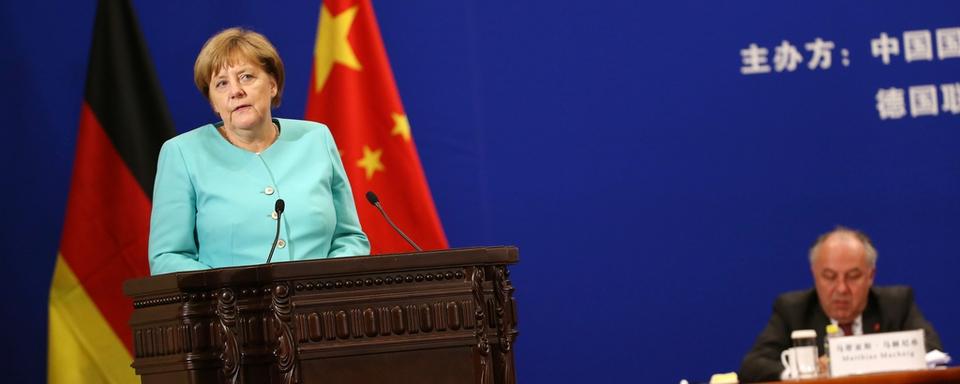 La chancelière Angela Merkel a effectué une visite de plusieurs jours en Chine. [AP/Keystone - How Hwee Young]