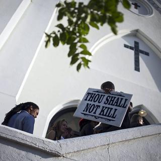 L'église AME de Charleston, théâtre de la tuerie. L'inscription sur le panneau dit: "Tu ne tueras point". [EPA/Keystone - John Taggart]