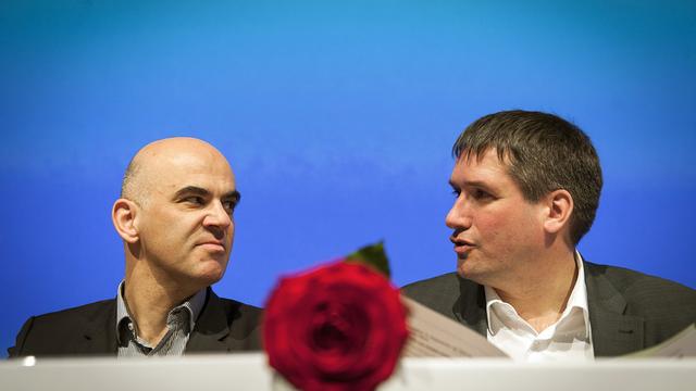 Alain Berset et Christian Levrat. [Keystone - Olivier Maire]